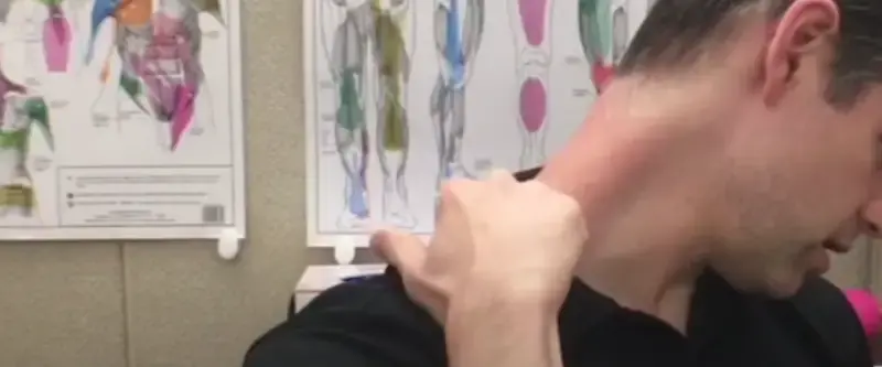 A cyclist with neck strain after a long ride