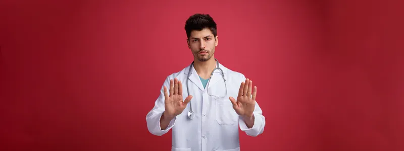 A doctor performing a neurological exam on a patient