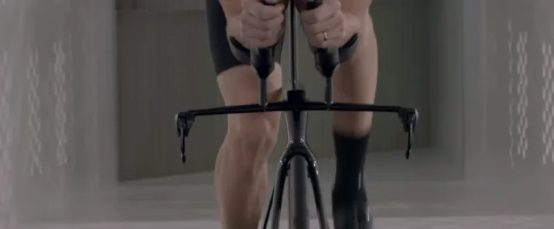 A man performing a shoulder blade wall press