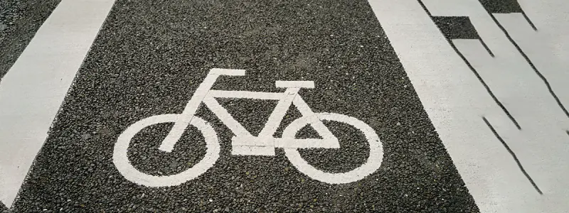 A protected, dedicated bike lane in an urban city