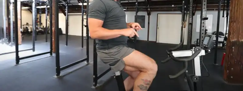 Applying an ice pack to a swollen, inflamed knee