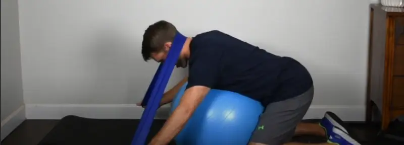 Applying pressure to a trigger point in the trapezius muscle