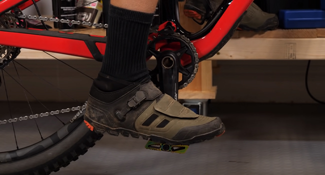 Correct foot placement on the pedal for efficient ankling