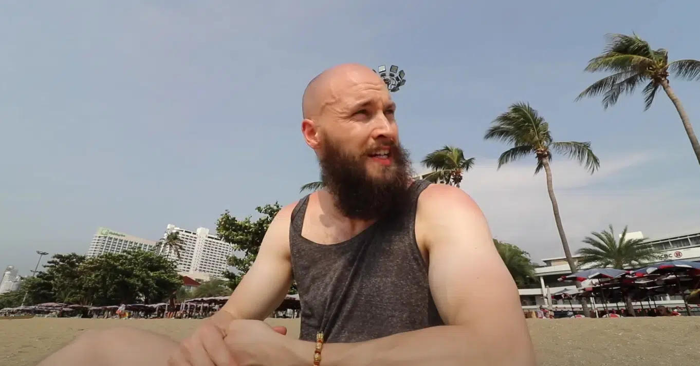 Cyclist adjusting helmet liner for shaved head comfort