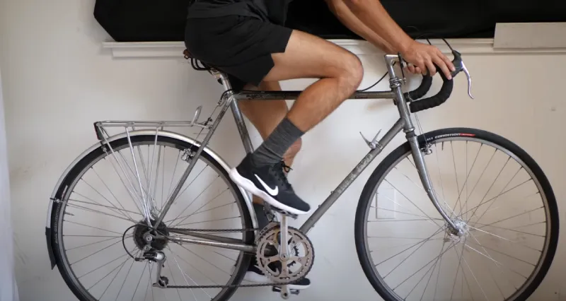 Cyclist stretching after knee arthritis ride