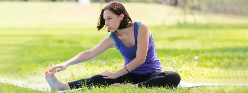 Stretching during a ride break to prevent overuse