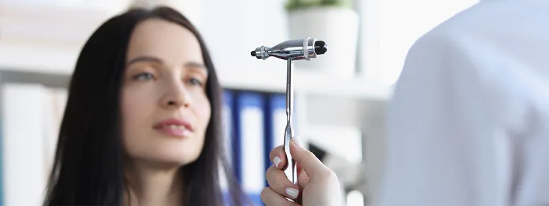 Woman doing a gentle neck stretch to relieve tension